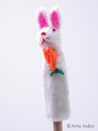 Finger puppet. Rabbit white with carrot