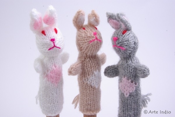 Finger puppet. Three rabbits