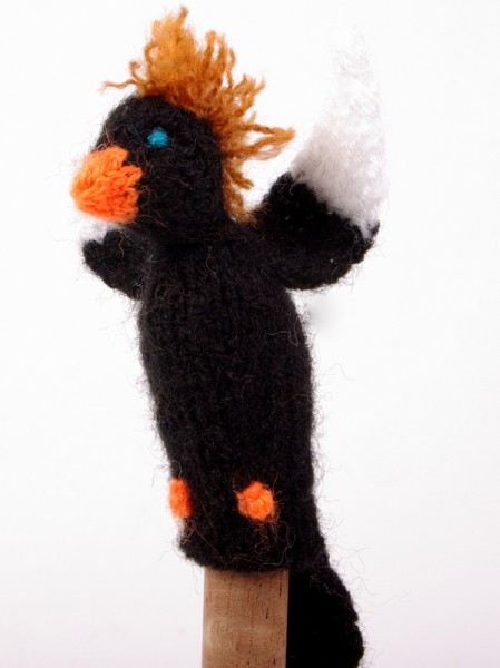 Finger puppet. Woodpecker black