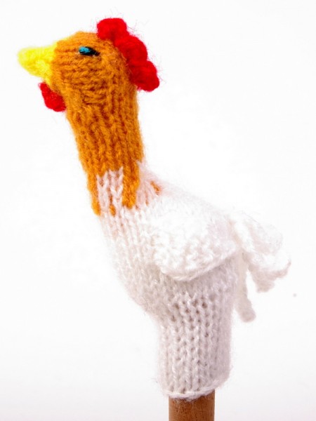 Finger puppet. White rooster
