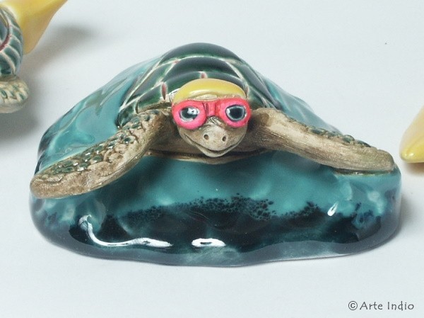 Watersports turtle, swimmer